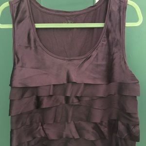 Ruffled sleeveless shirt goes perfect with shorts